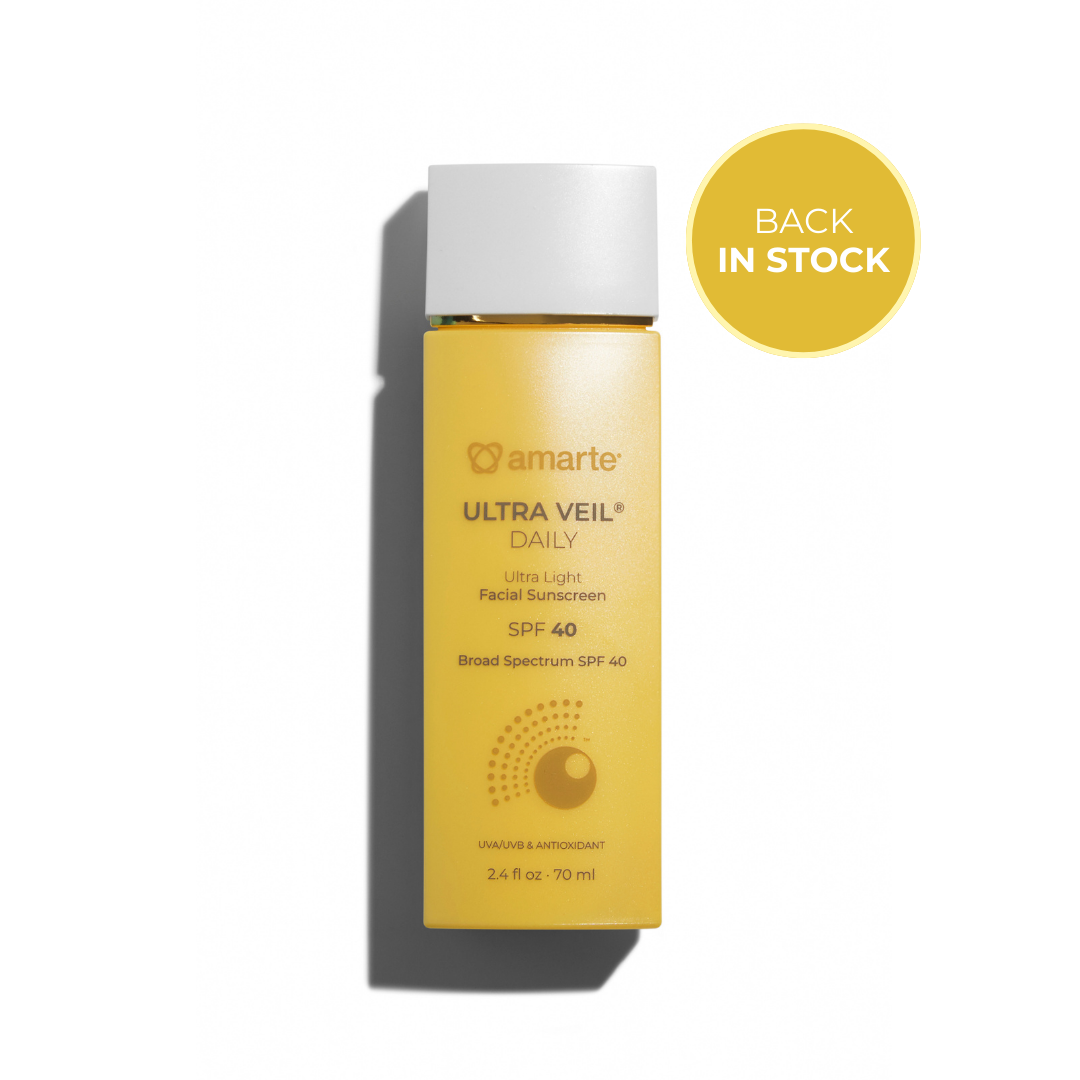Amarte Ultra Veil Daily sunscreen bottle on a white background with 'Back in Stock' label.
